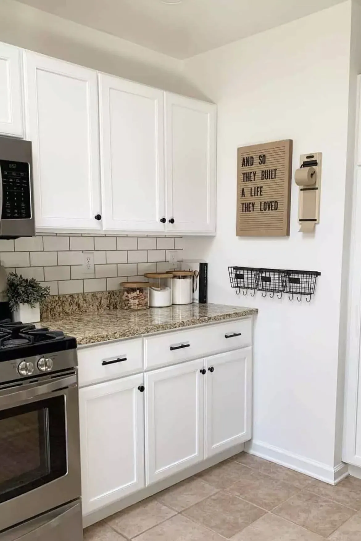 10 Decorating Ideas for Above Kitchen Cabinets to Transform Your Kitchen 10 a simple kitchen with backsplash and marble countertop