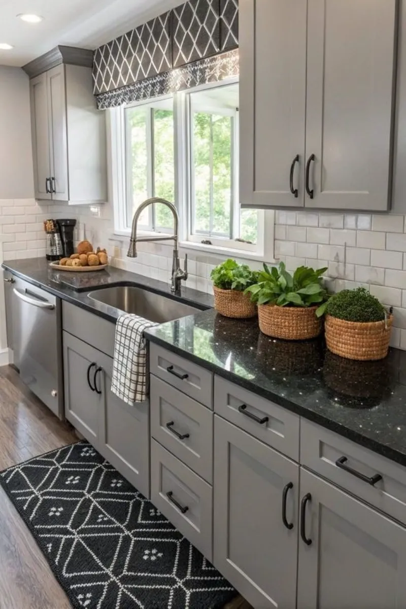 6 Small Grey Kitchen Ideas That Still Feel Open 6 a grey kitchen with white backsplash and black counter