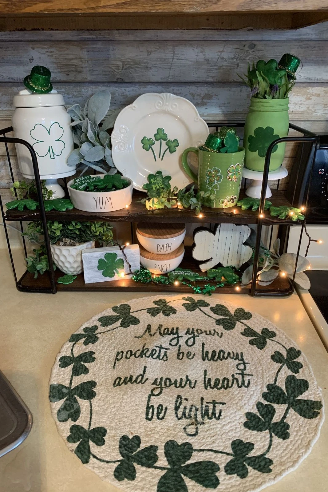 kitchen countertop decorated with festive mugs for saint patrick day