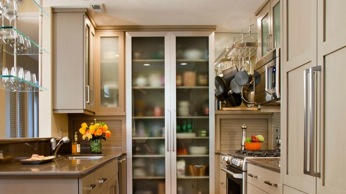 Short on Space? 10 Basement Galley Ideas That Work 1 a basement galley kitchen with glass-front cabinets