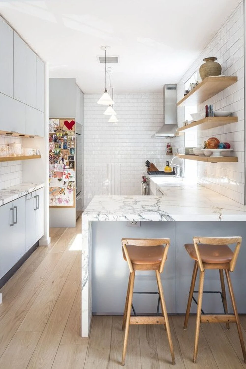 Short on Space? 10 Basement Galley Ideas That Work 7 a basement galley kitchen with peninsula breakfast bar