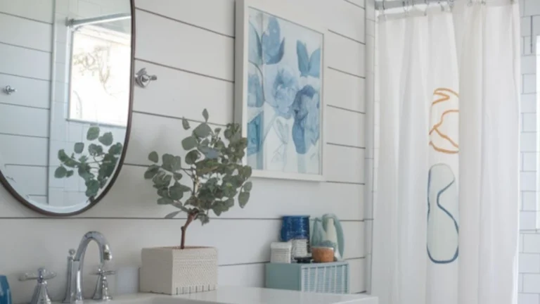 a bathroom with shiplap panels