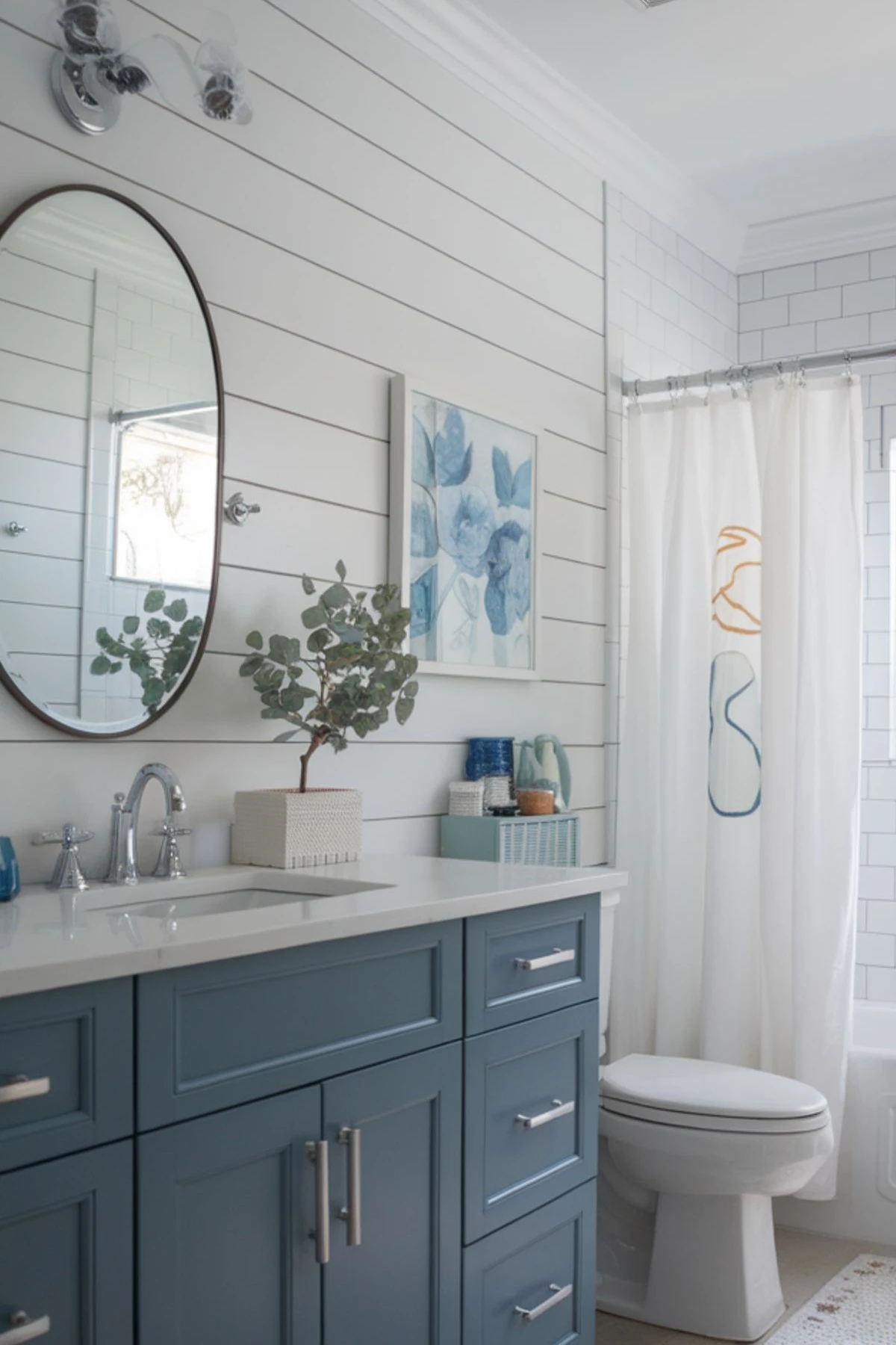 a bathroom with shiplap panels