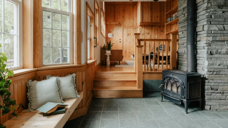 cozy reading nook near windows with pillows
