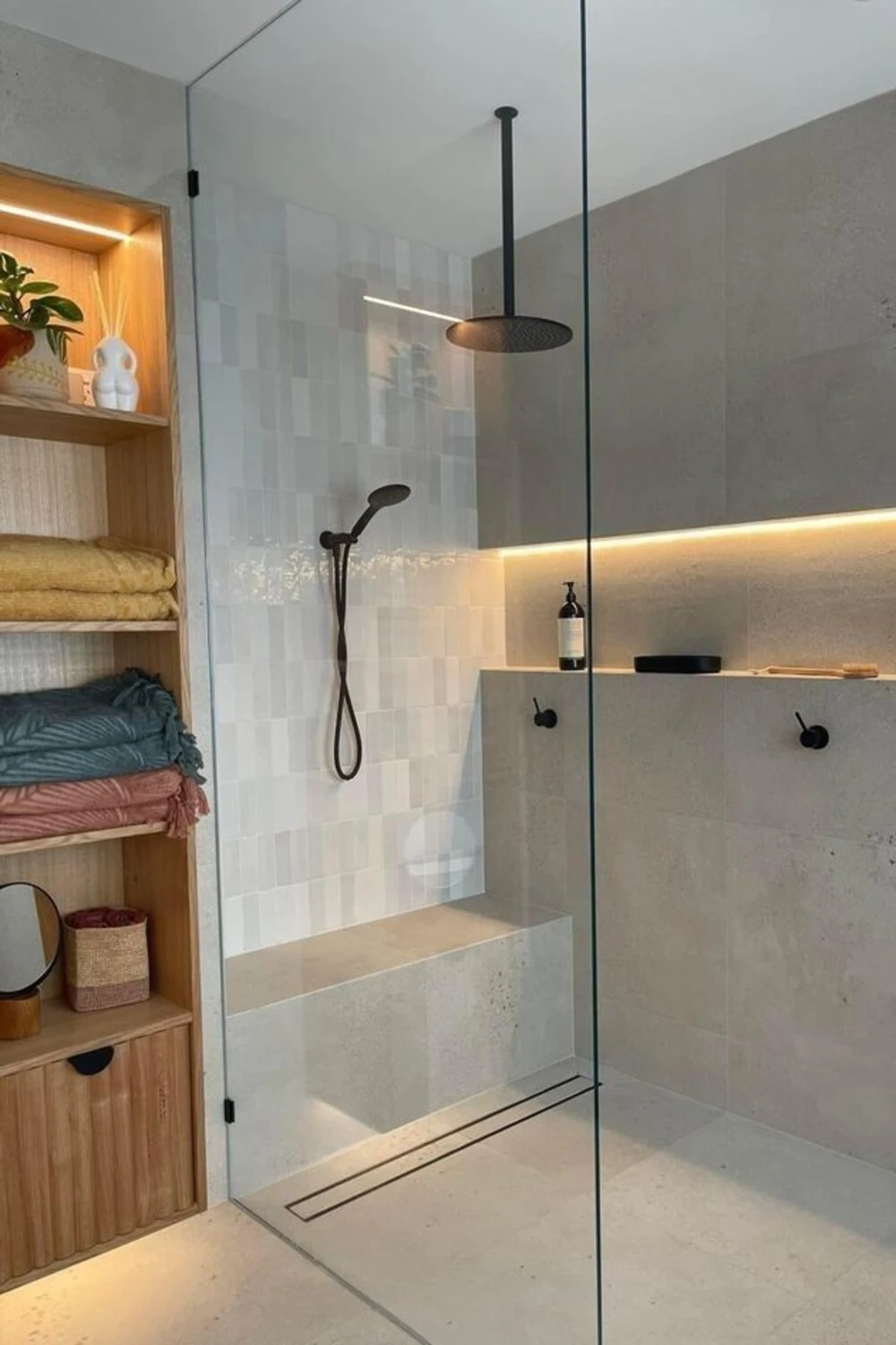 How to Design a Small Bathroom Shower: 12 Space-Saving Ideas 10 a small bathroom with shower bench