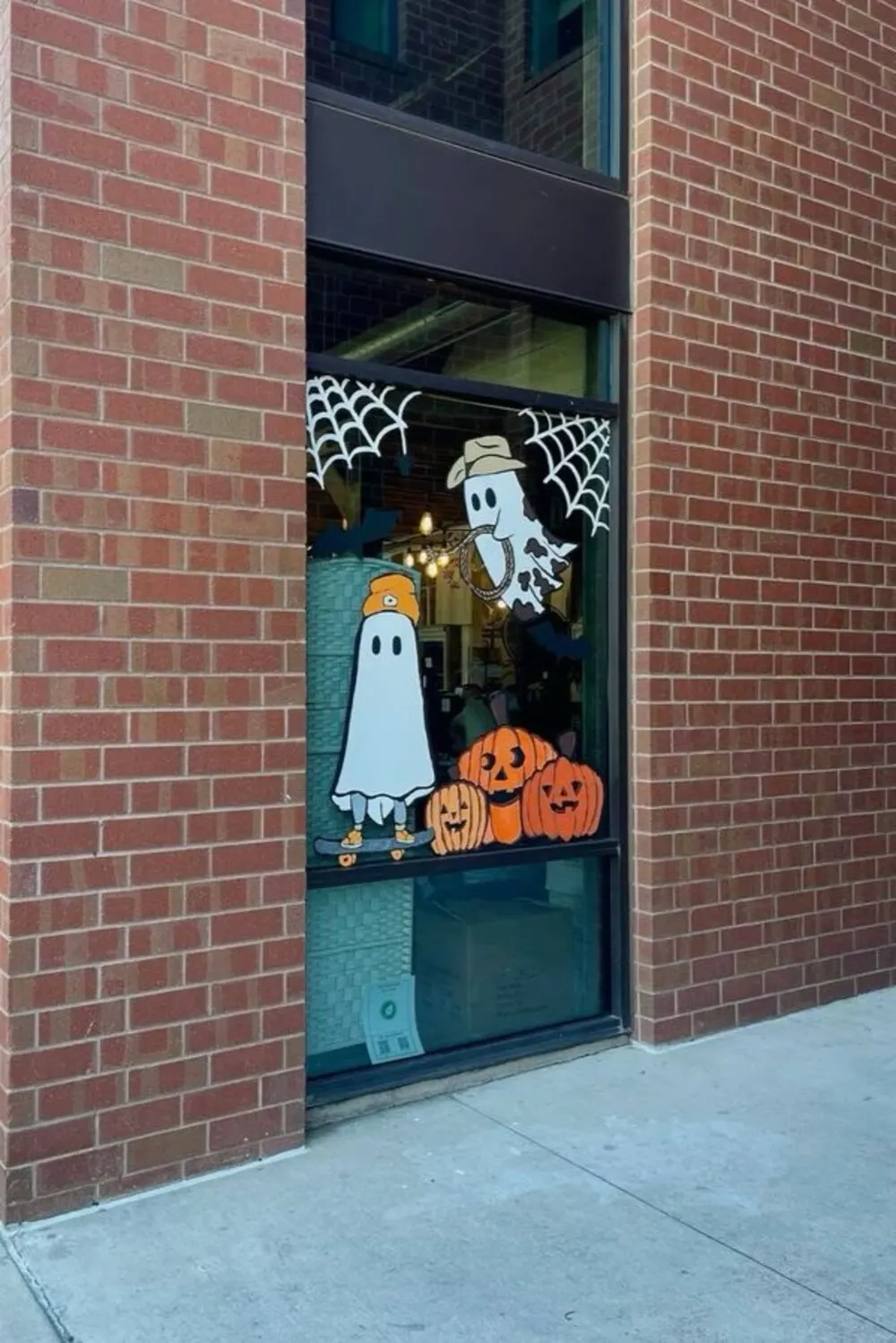 halloween office window with ghost stickers