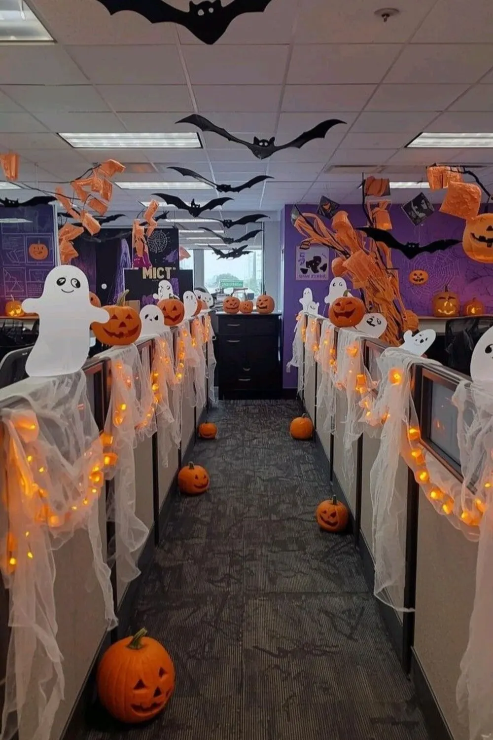 halloween office with faux cobwebs